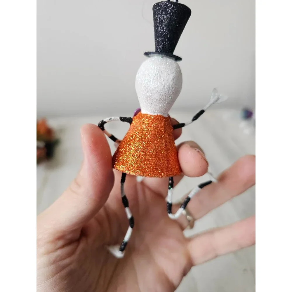 Pier 1 skeleton glitter ornament bow tie top hat Halloween Xmas tree black and w